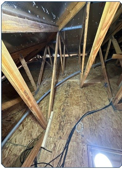Attic after plywood decking in Cape Coral — OSB flooring installed for storage